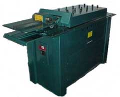 Photo of TinKnocker Fourplex Cleat foming machine